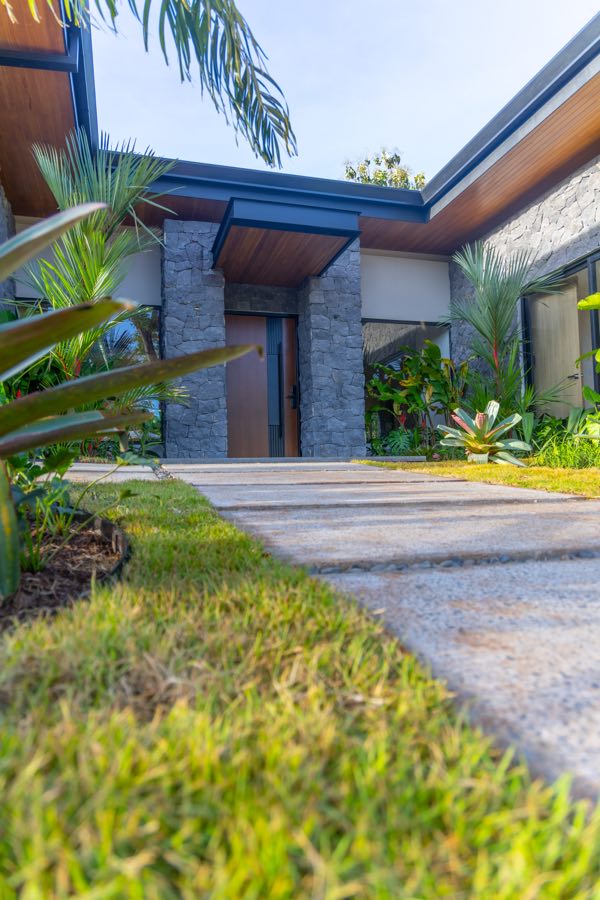 Approach and planting to a finished house