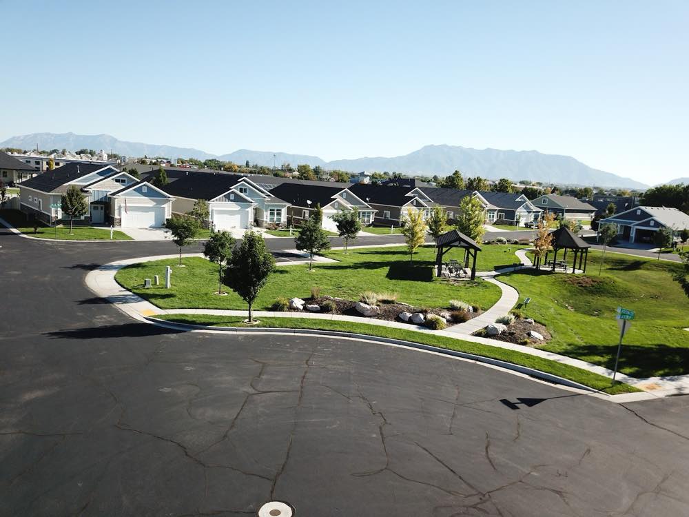 Aerial view of Jackson Court, Syracuse — single-level homes around a landscaped green