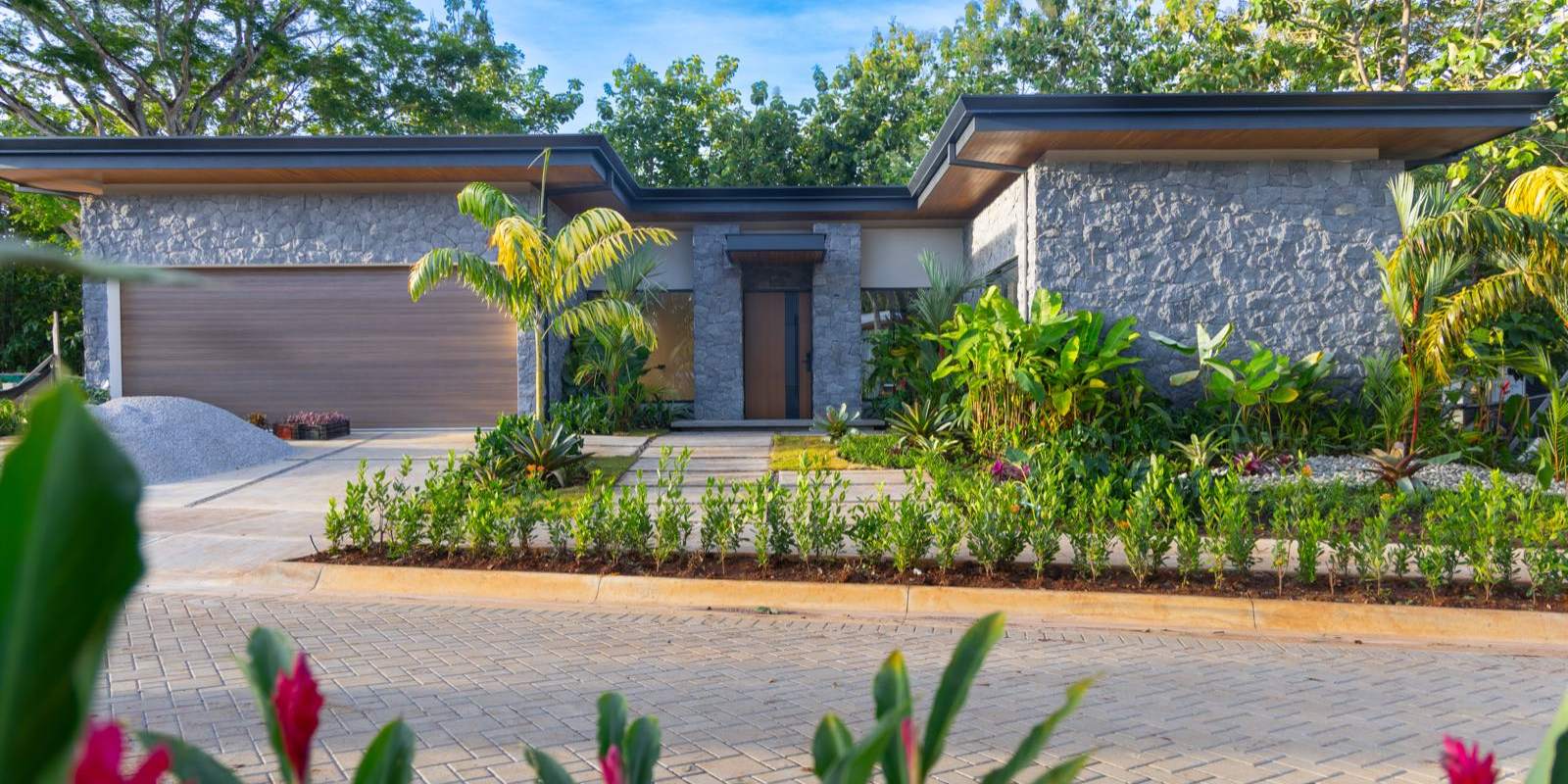 A completed Black Coast residence at Playa Negra, volcanic stone and teak